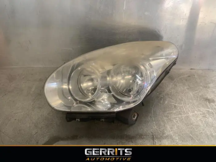 Headlight, left Opel Combo
