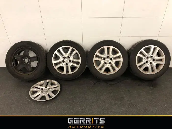 Set of wheels + tyres Opel Astra